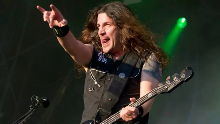 Anthrax Bassist Tells A Drunk Story of His Band and Metallica, Breaking Kirk Hammett’s Door